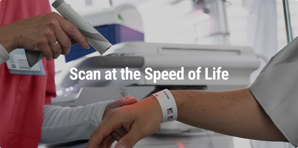 mobile-hero Nurse scanning patient wristband for medication
